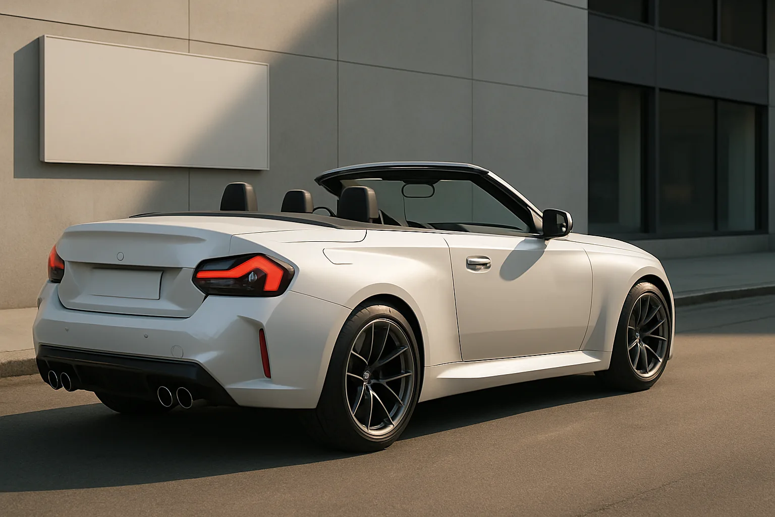 A white convertible sports car with black wheels and open roof parked beside a modern building in soft daylight