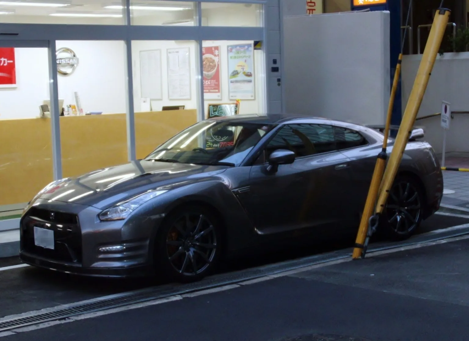 2012 Nissan GT-R (DBA-R35) model, left side view