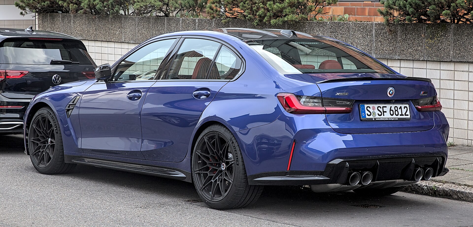 BMW M3 Competition (G80) in a contemporary setting.