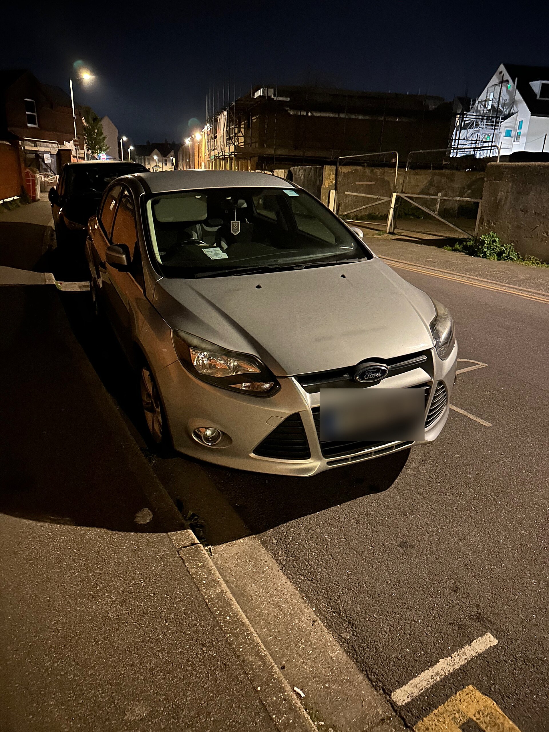 Ford Focus Mk3 in silver, parked on Jeffrey Street, Gillingham, Medway.