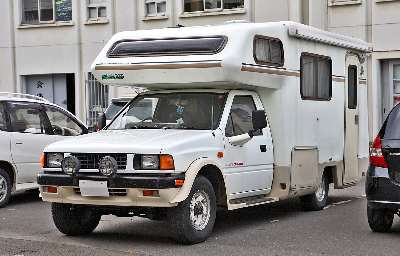 Isuzu Rodeo SUV in a parking lot