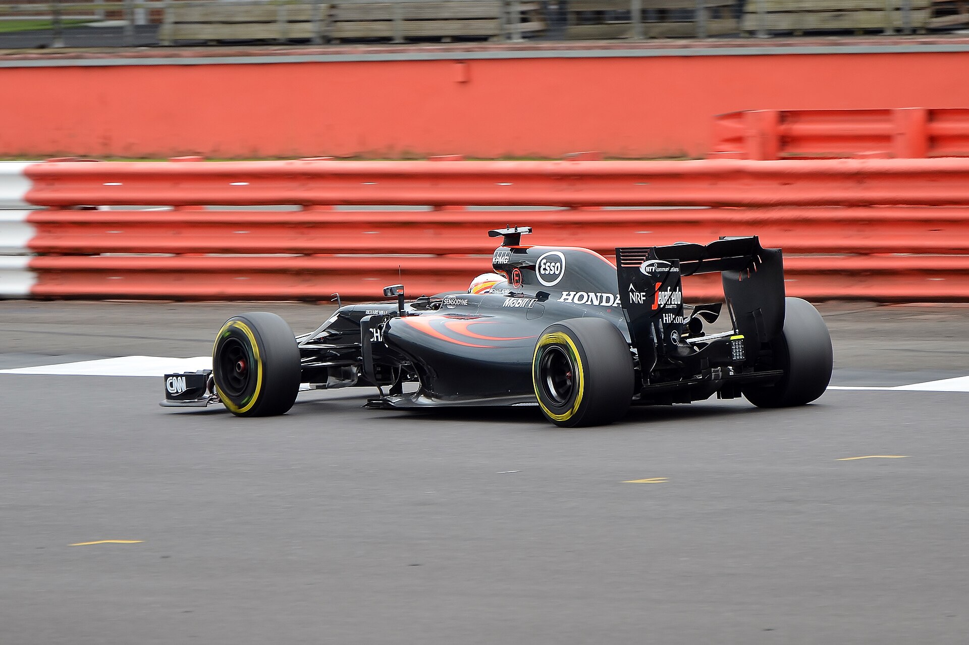 Fernando Alonso driving the McLaren-Honda MP4-31 at the 2016 British Grand Prix.