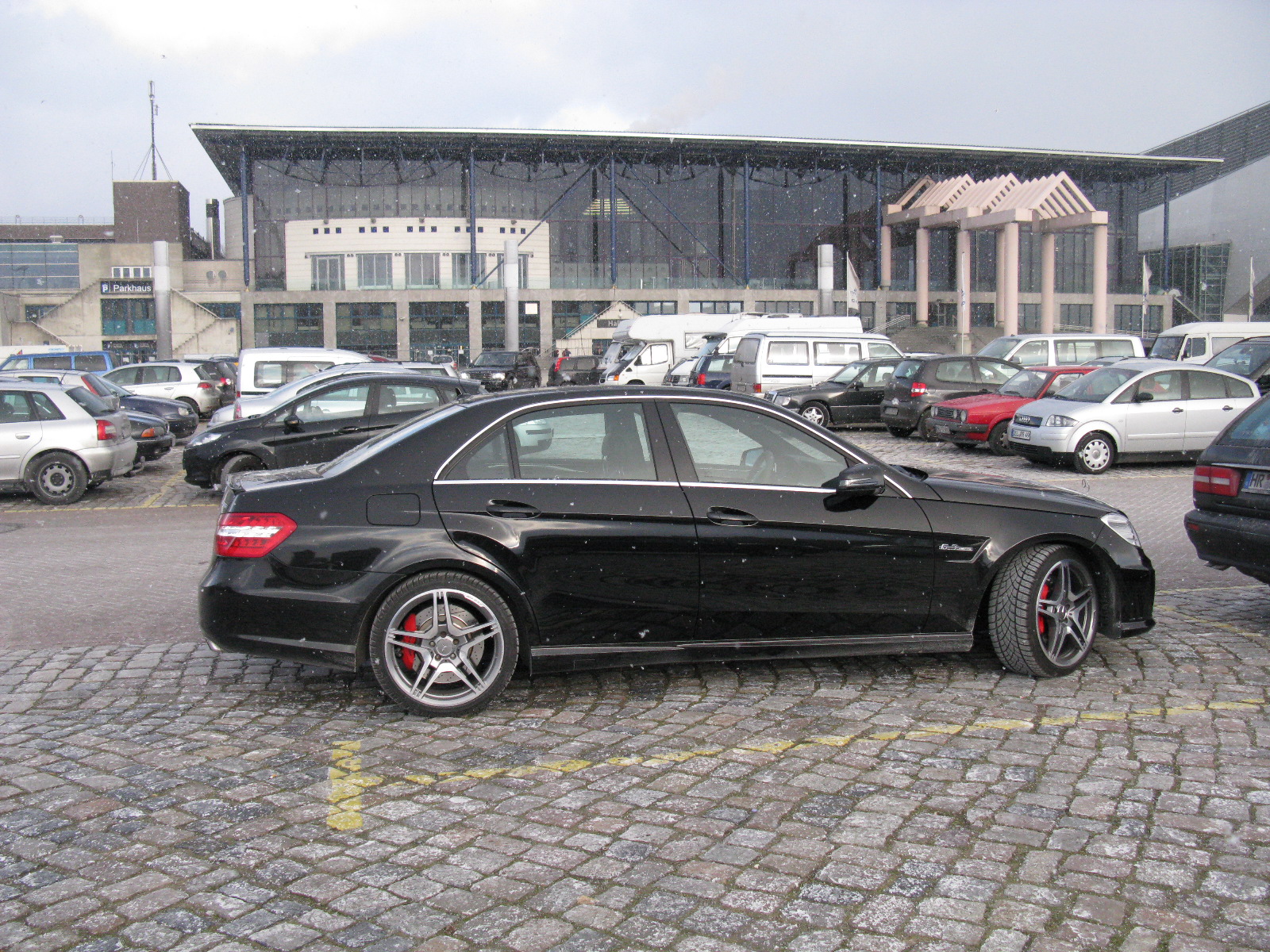 Mercedes-Benz E63 AMG (W212) in silver, front and side view