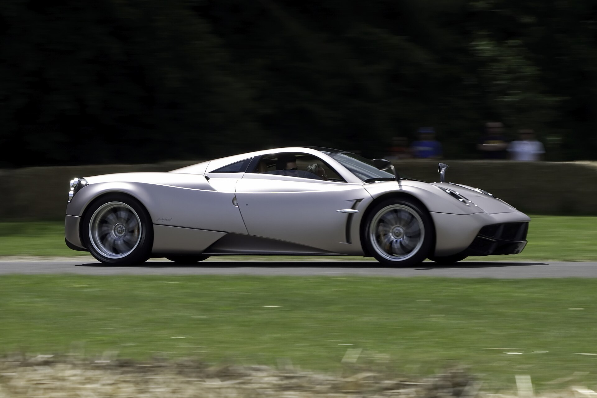 Pagani Huayra at a car show, front three-quarter view.