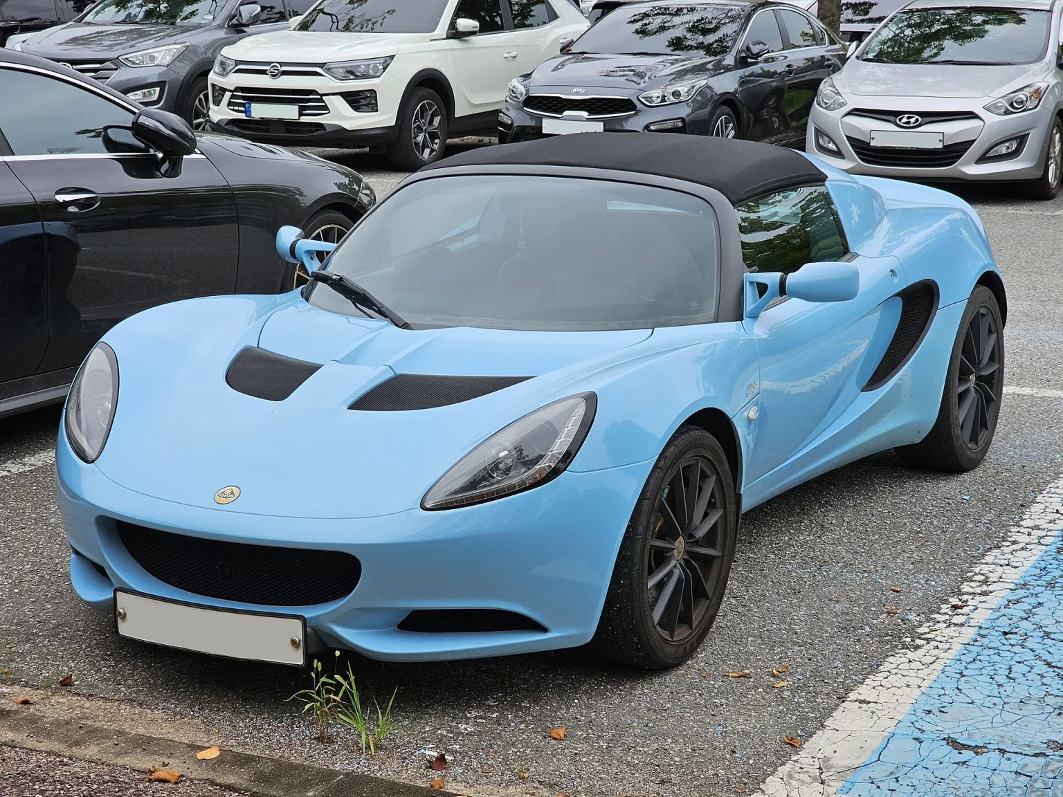 Lotus Elise Club Racer Series 3 in Sky Blue, front view.
