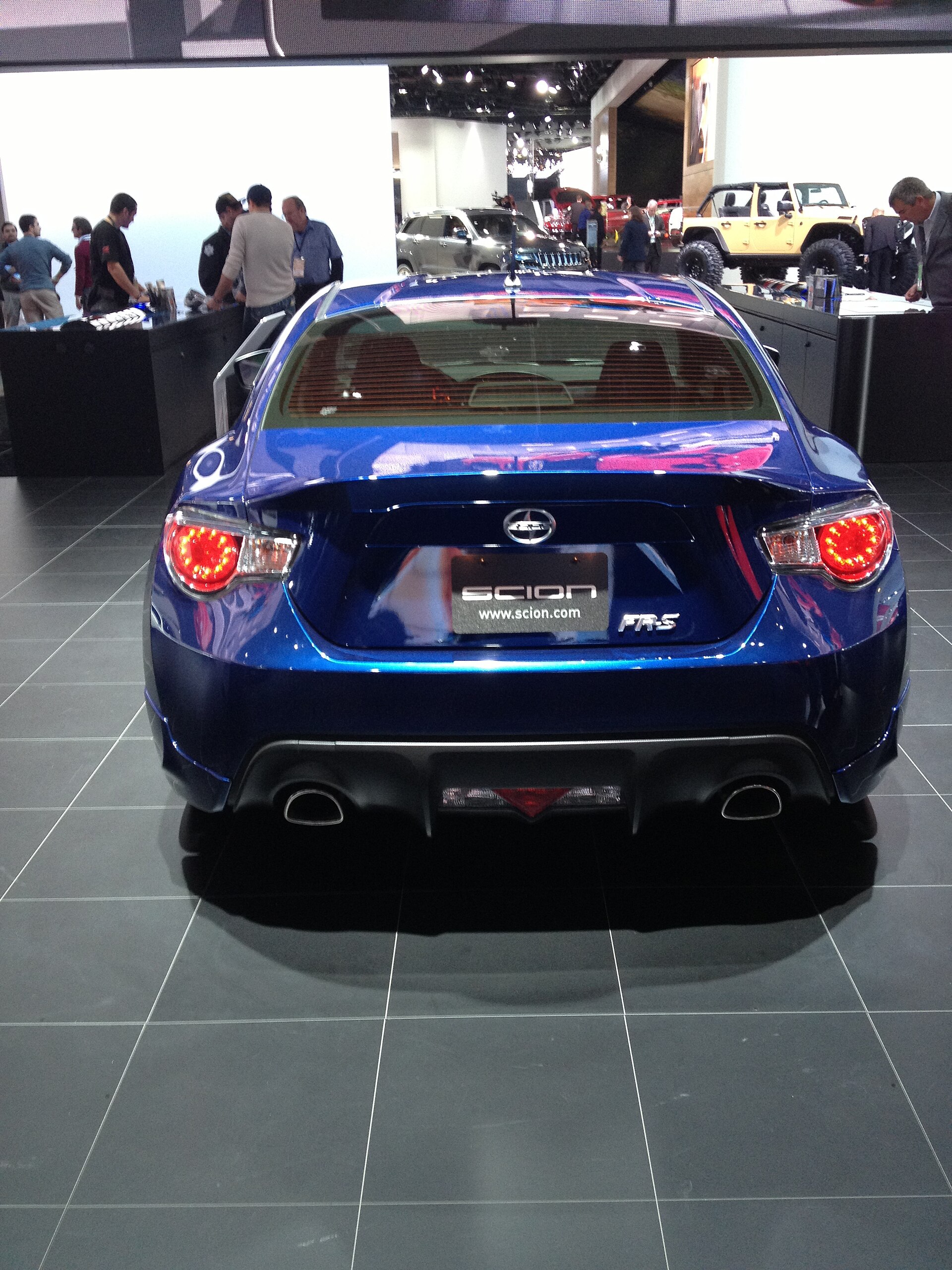 2013 Scion FR-S in red, front and side view