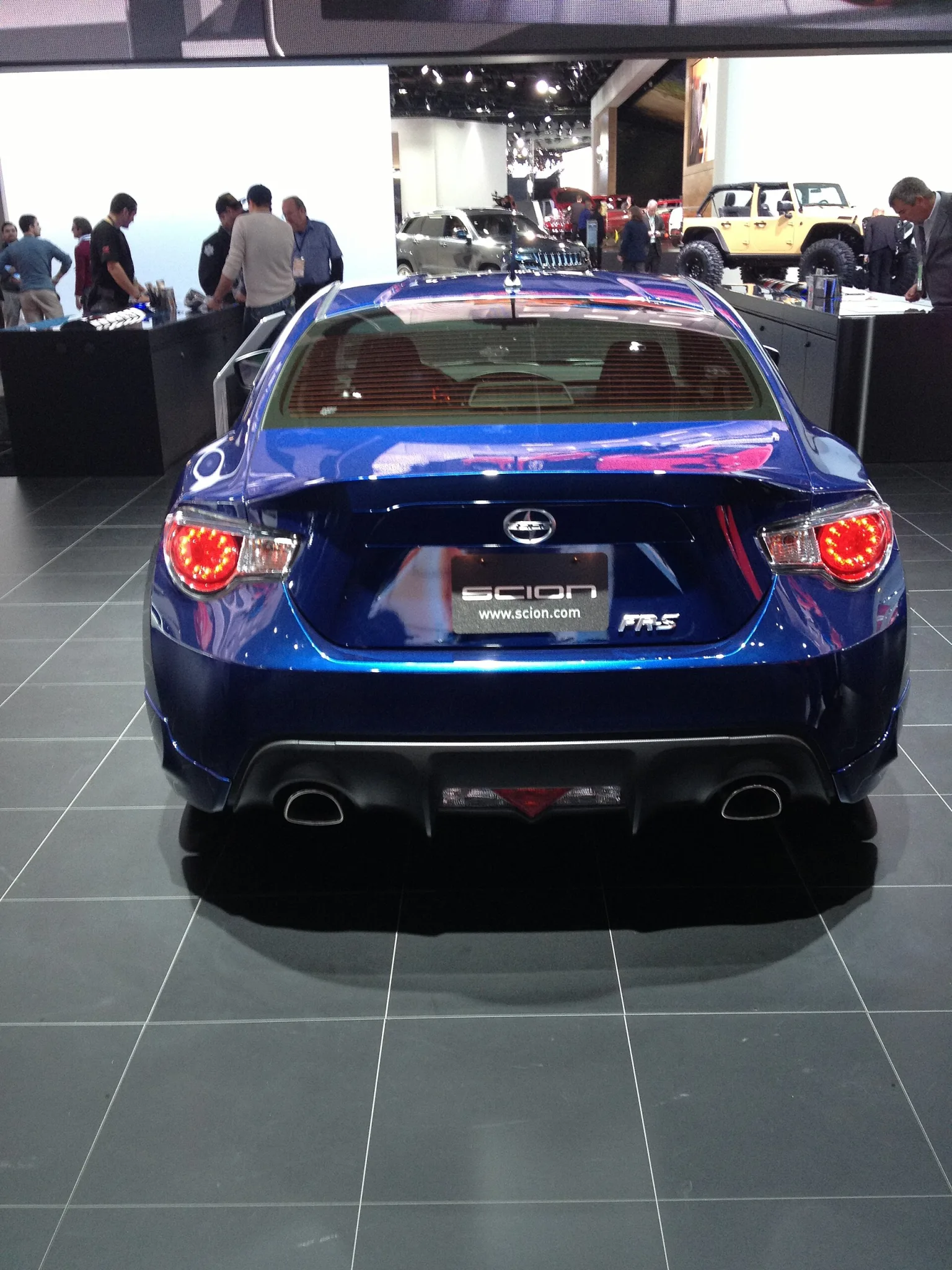 2013 Scion FR-S in red, front and side view