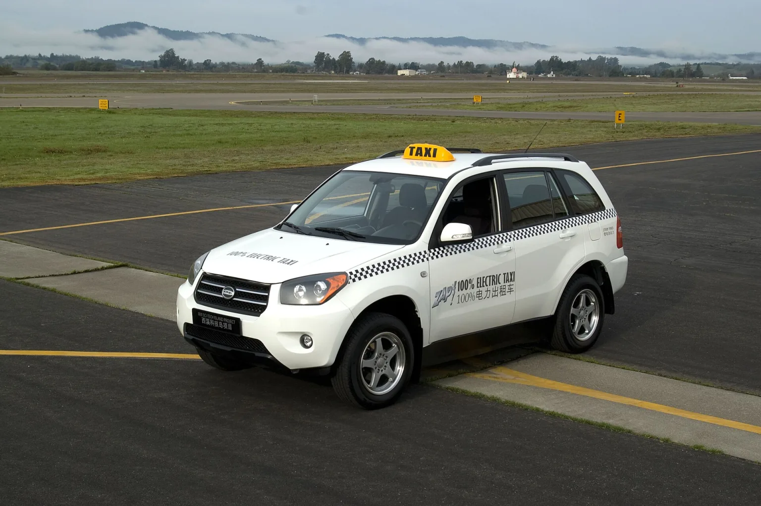 ZAP Jonway electric taxi at a motor show in 2010