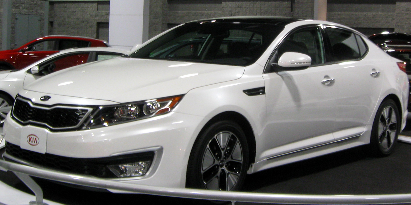 2011 Kia Optima Hybrid in the US, front three-quarter view