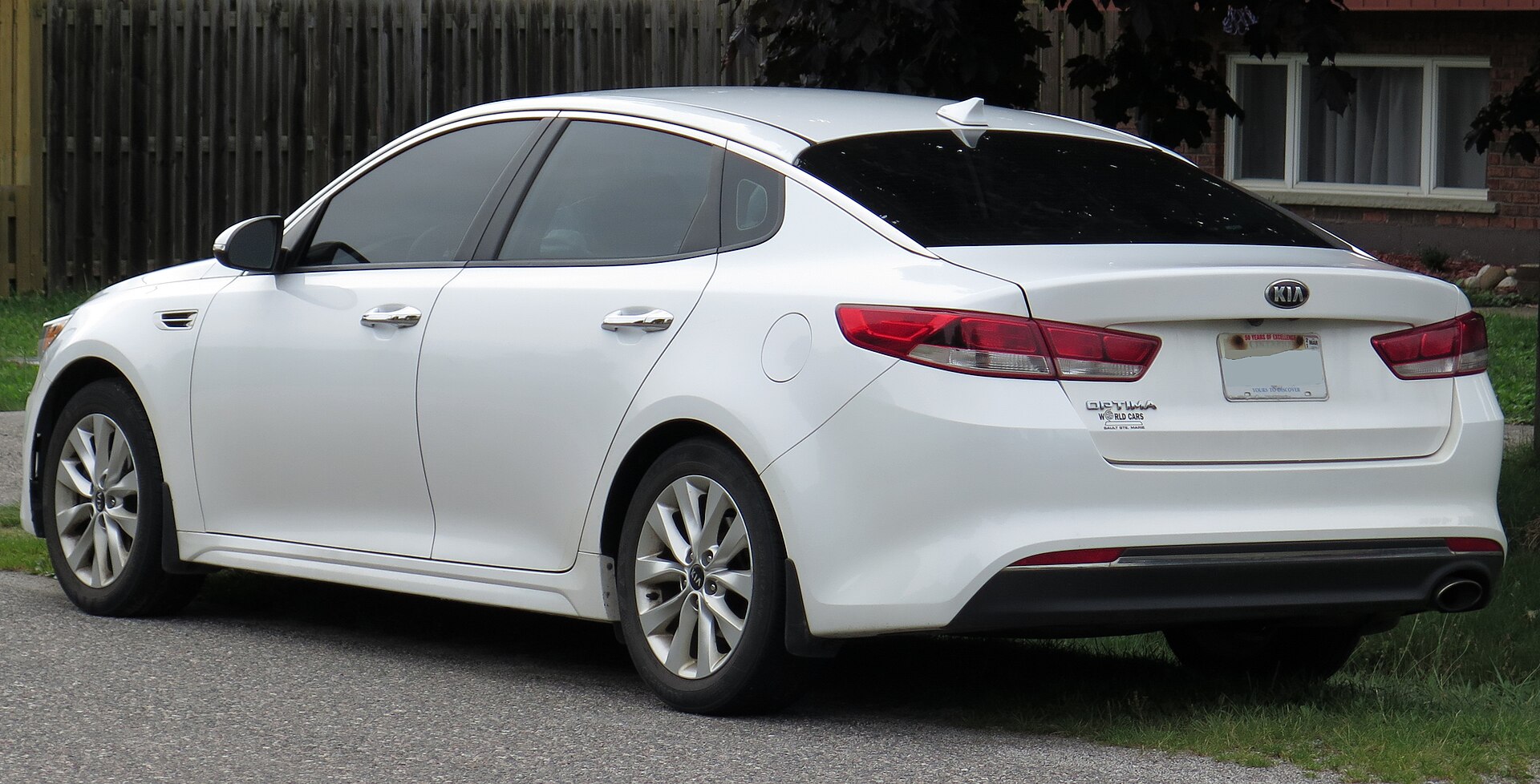 2016 Kia Optima LX Plus in Snow White Pearl, rear left view
