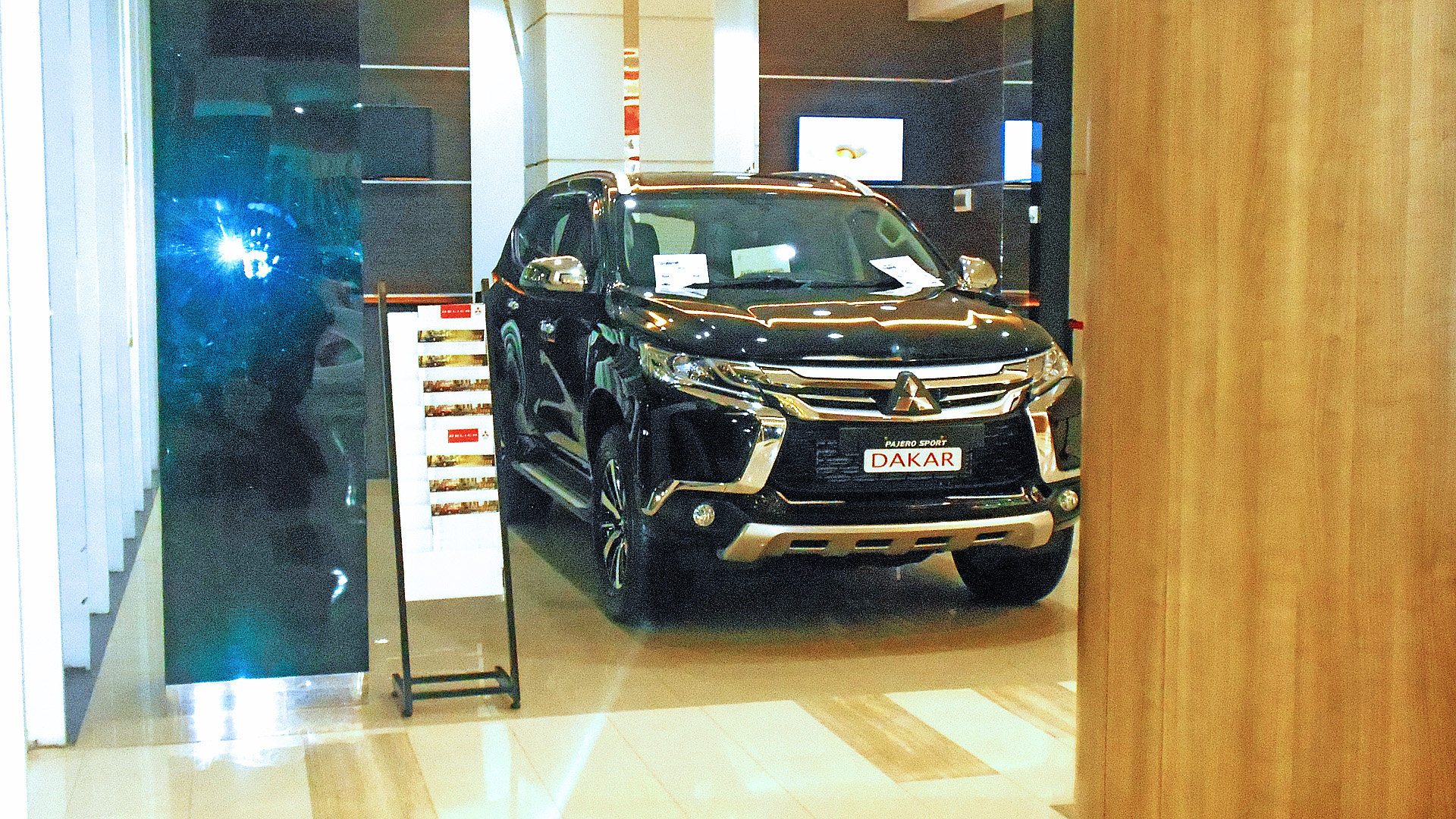 2016 Mitsubishi Pajero Sport photographed in Dakar, third generation model.