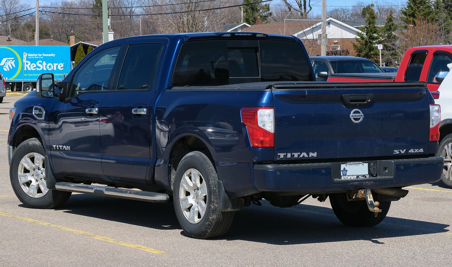 2017 Nissan Titan SV Crew Cab in Deep Blue Pearl, rear left