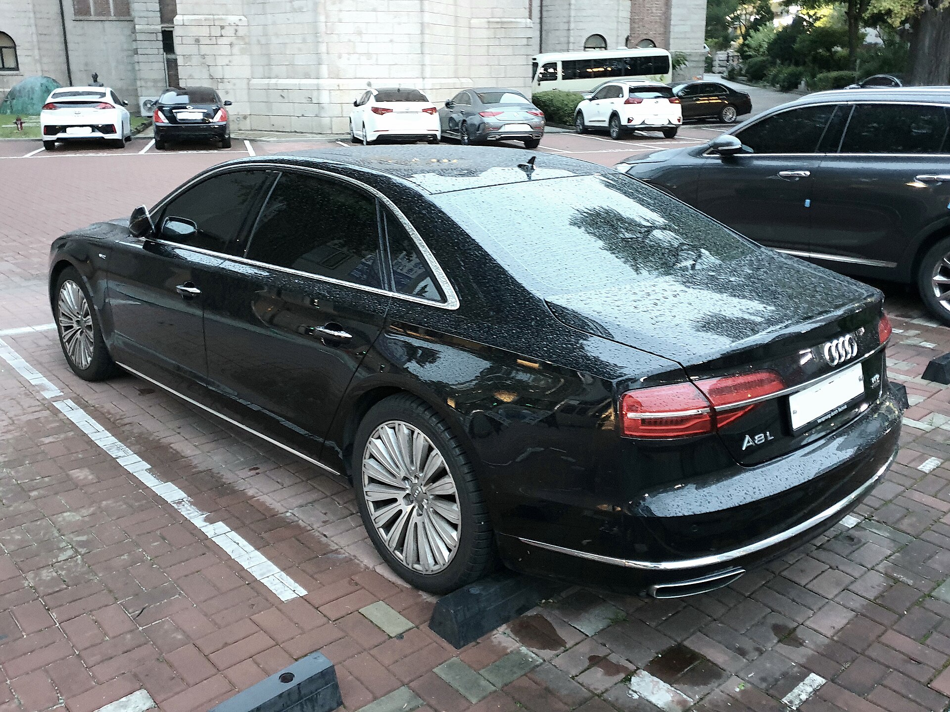 Audi A8 L W12 D4 in black, long-wheelbase flagship luxury saloon