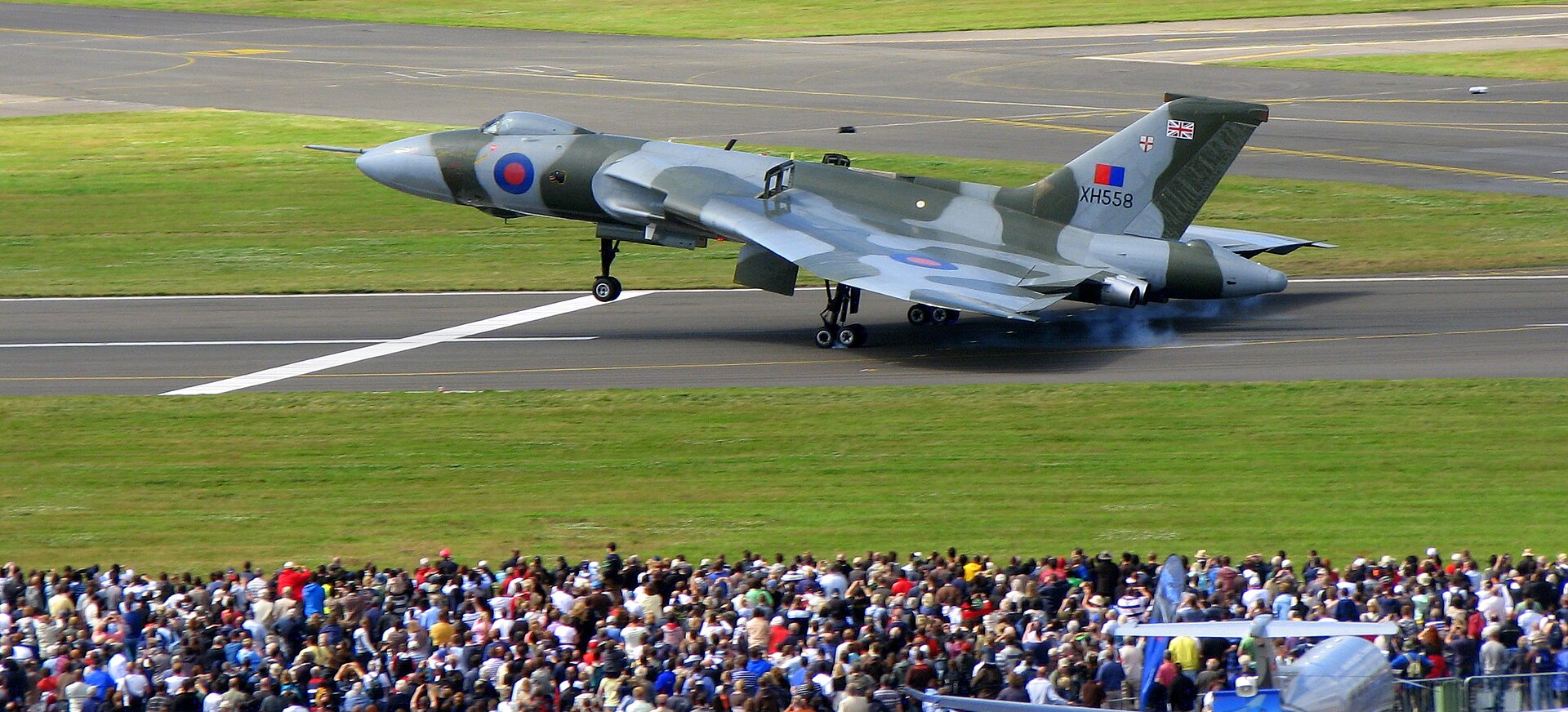Avro Vulcan XH558 taxiing on the runway.