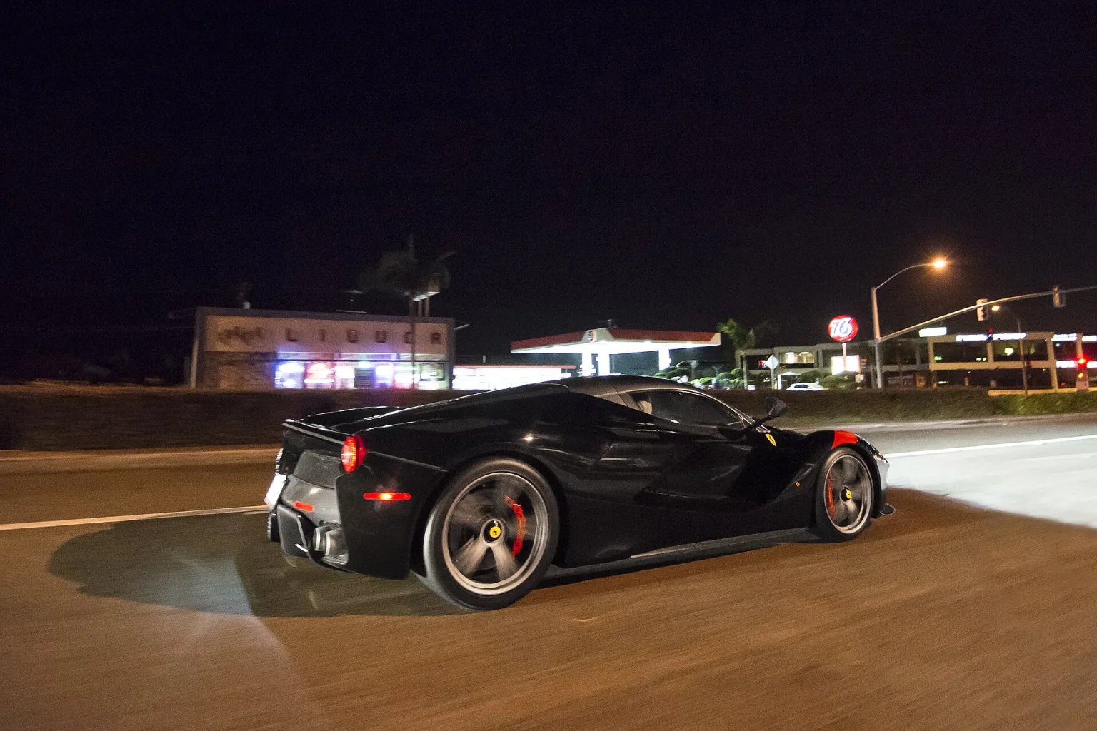 Black Ferrari LaFerrari with racing livery