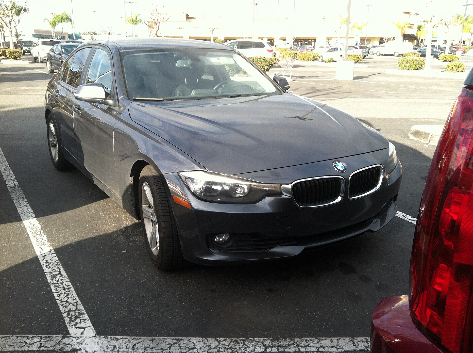 BMW 3 Series (F30) in a car park