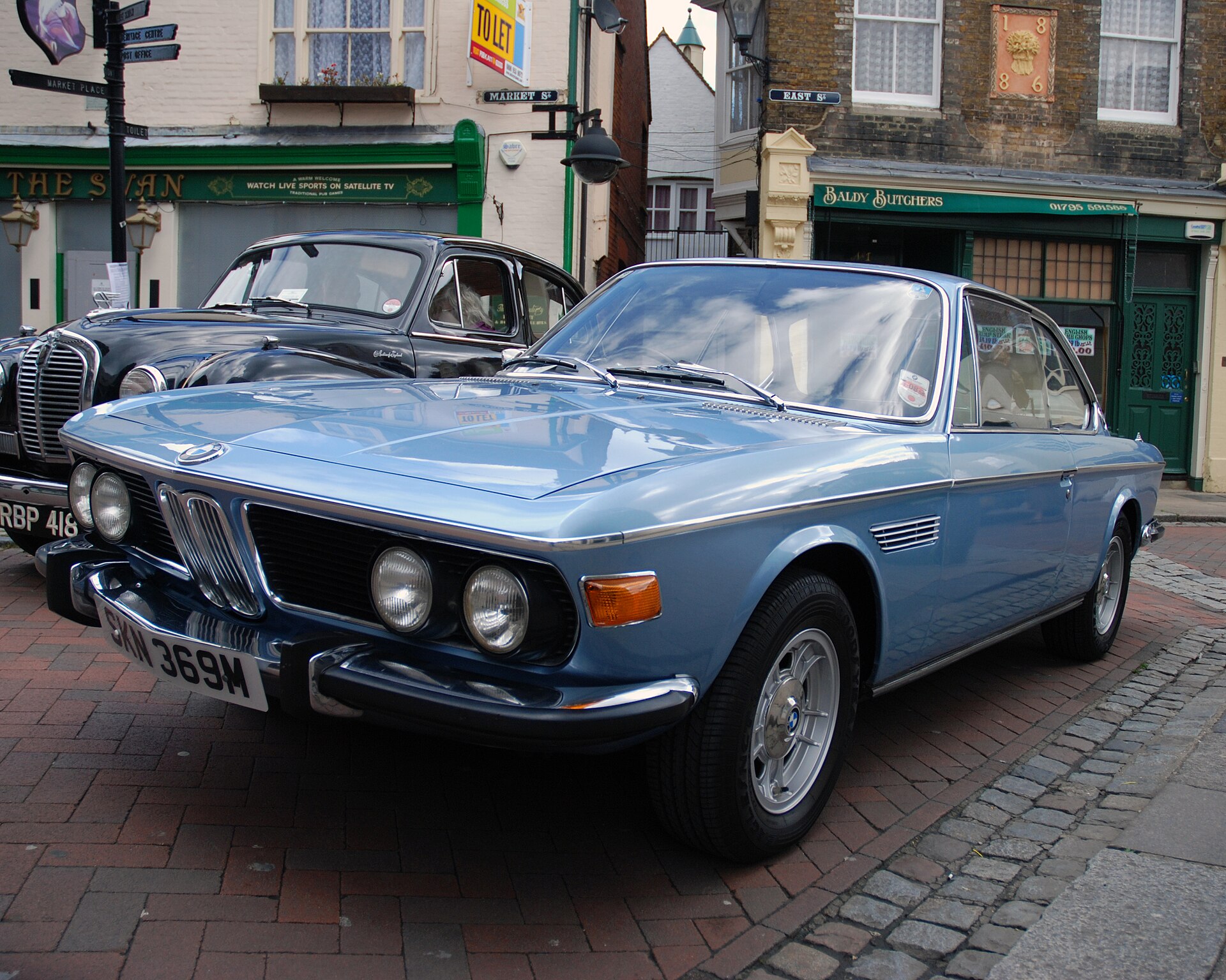 A contemporary BMW car, matching the article's subject on BMW drivers.