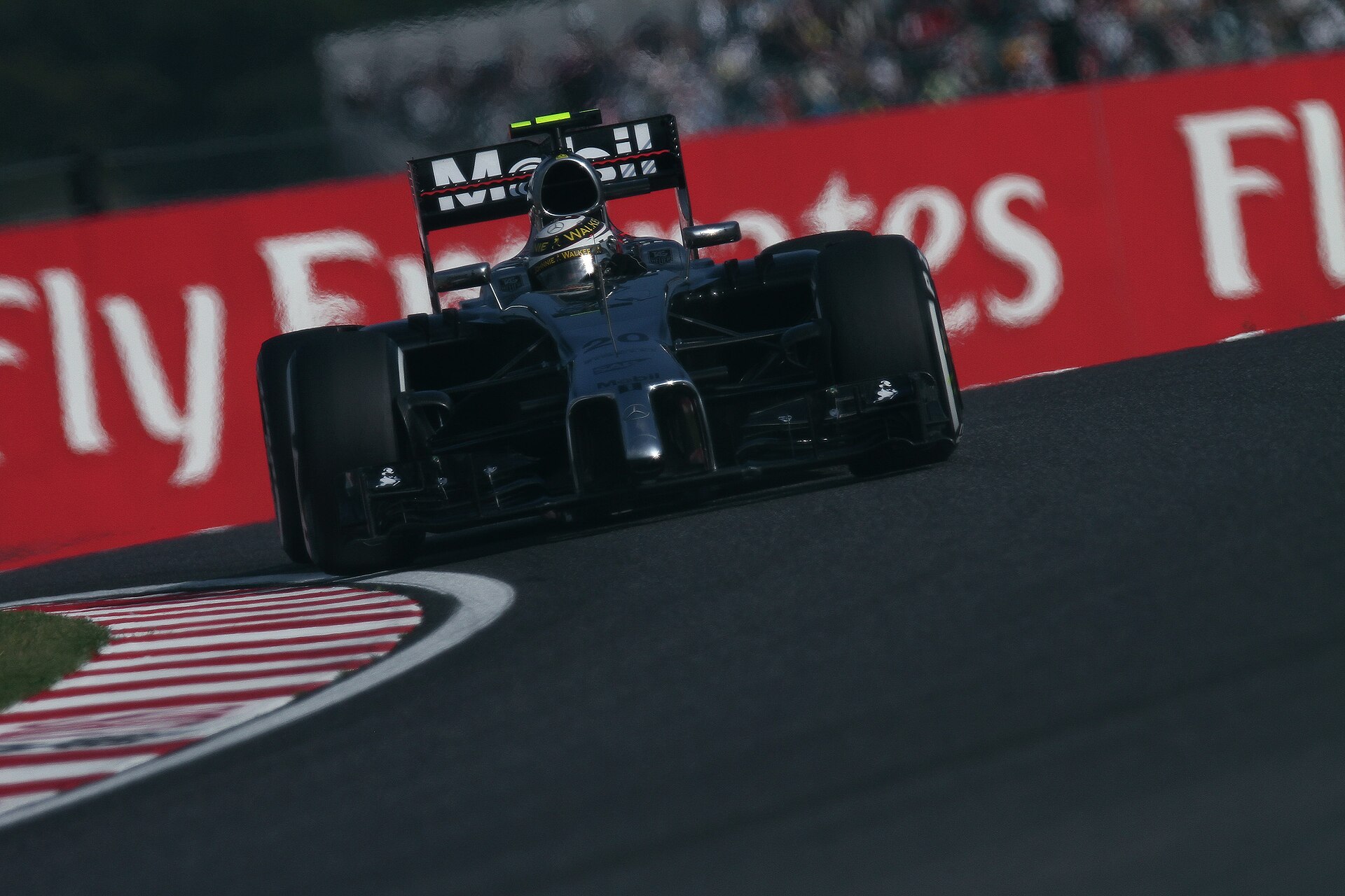 Kevin Magnussen driving McLaren No.20 in Formula 1, 2014 season.