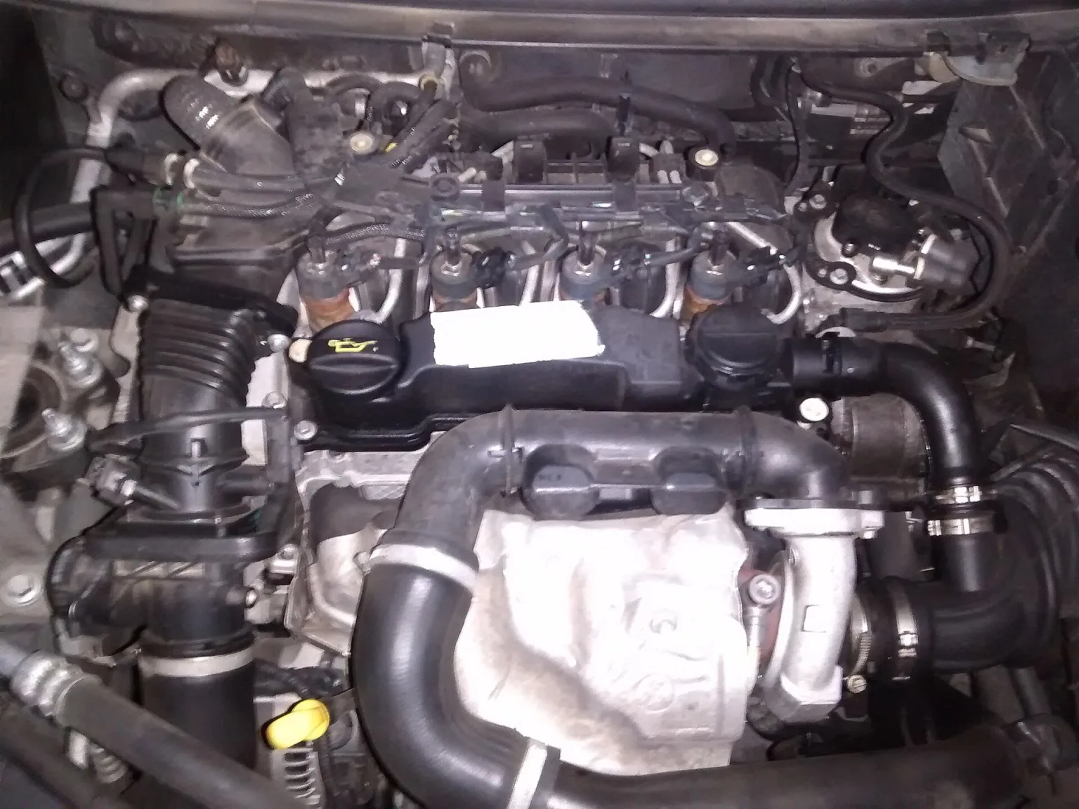 Ford 1.6 TDCi diesel engine, a result of the Ford-PSA partnership.