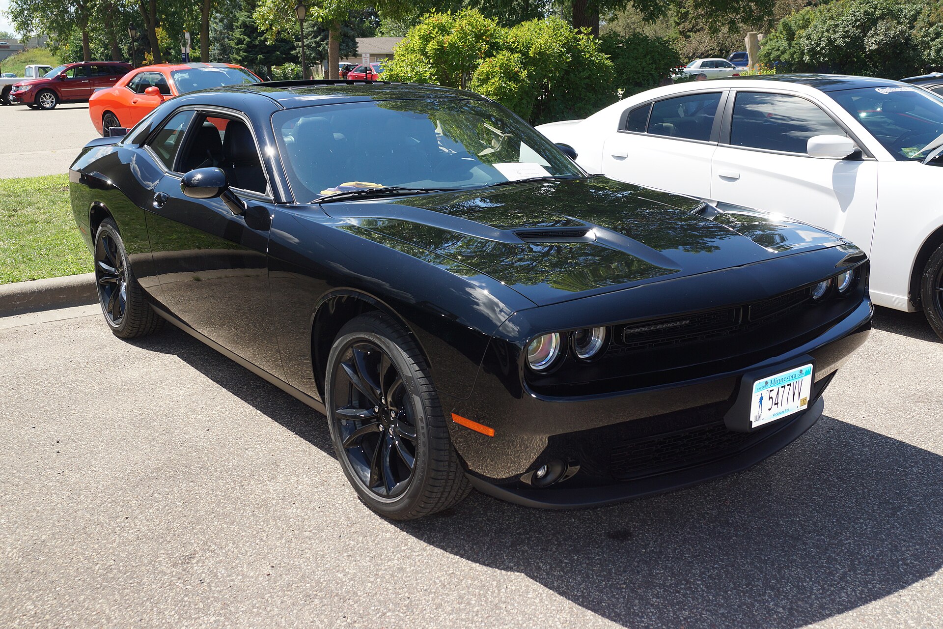 2016 Dodge Challenger in silver, front and side view