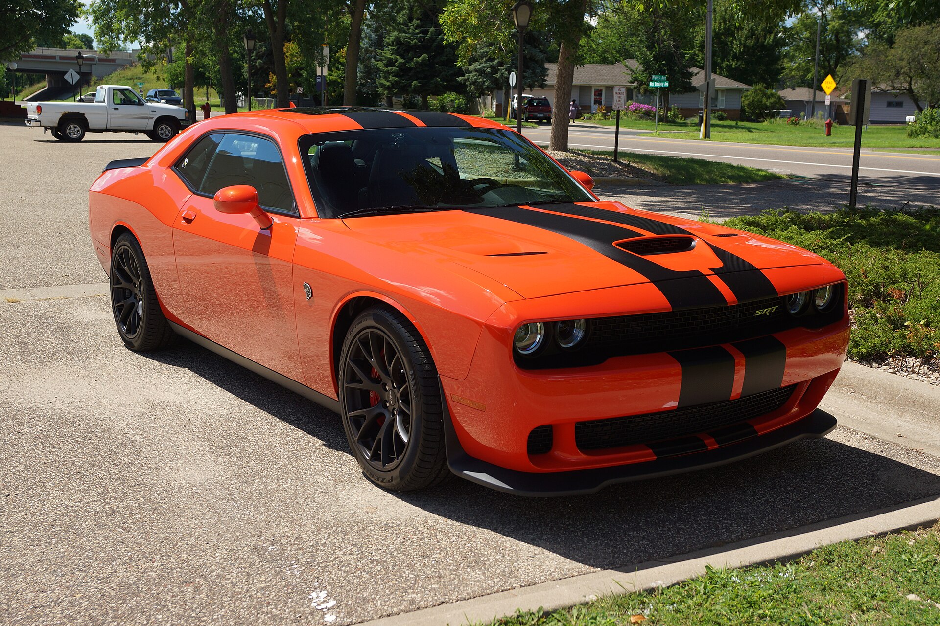 2016 Dodge Challenger SRT Hellcat in gray, front three-quarter view.