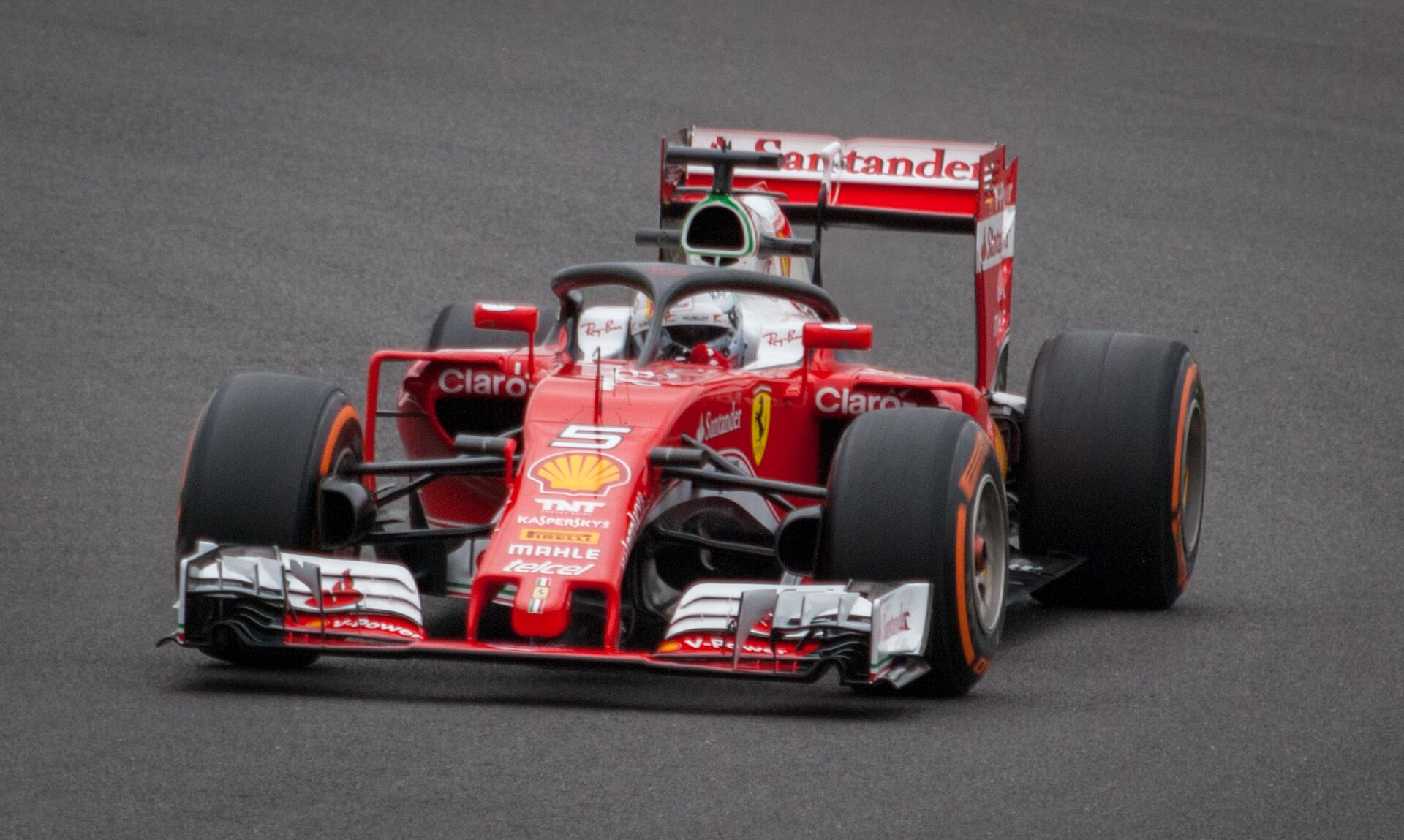 Sebastian Vettel driving a Ferrari F1 car equipped with the Halo device in 2018.