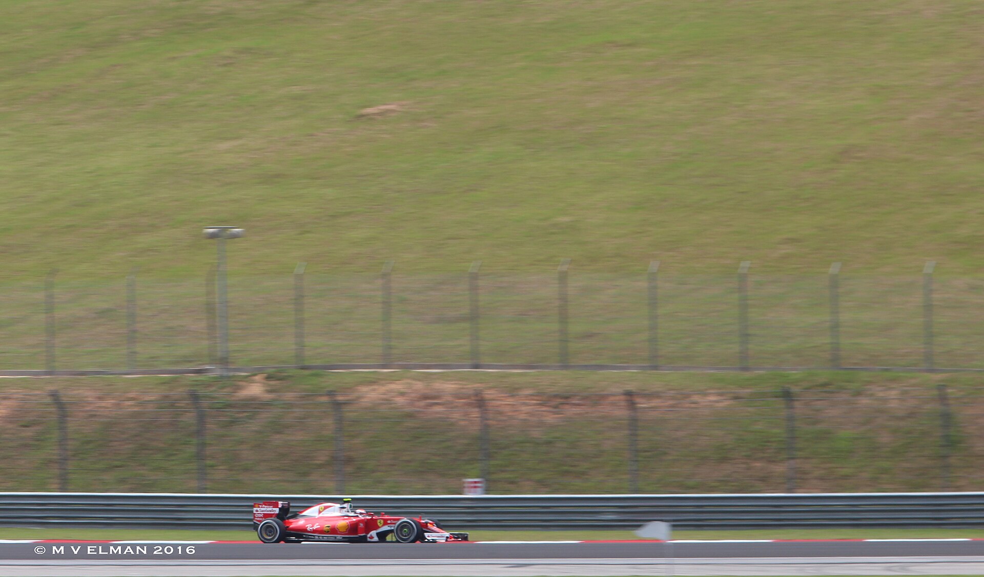 Kimi Raikkonen driving the Scuderia Ferrari SF16-H in 2016.