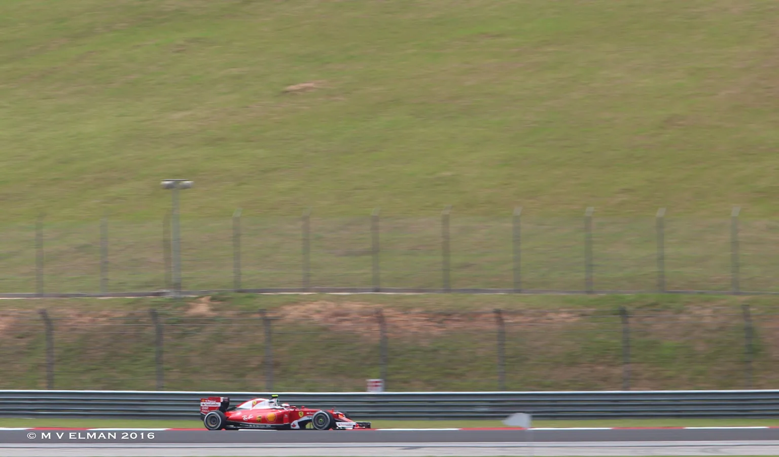 Kimi Raikkonen driving the Scuderia Ferrari SF16-H in 2016.