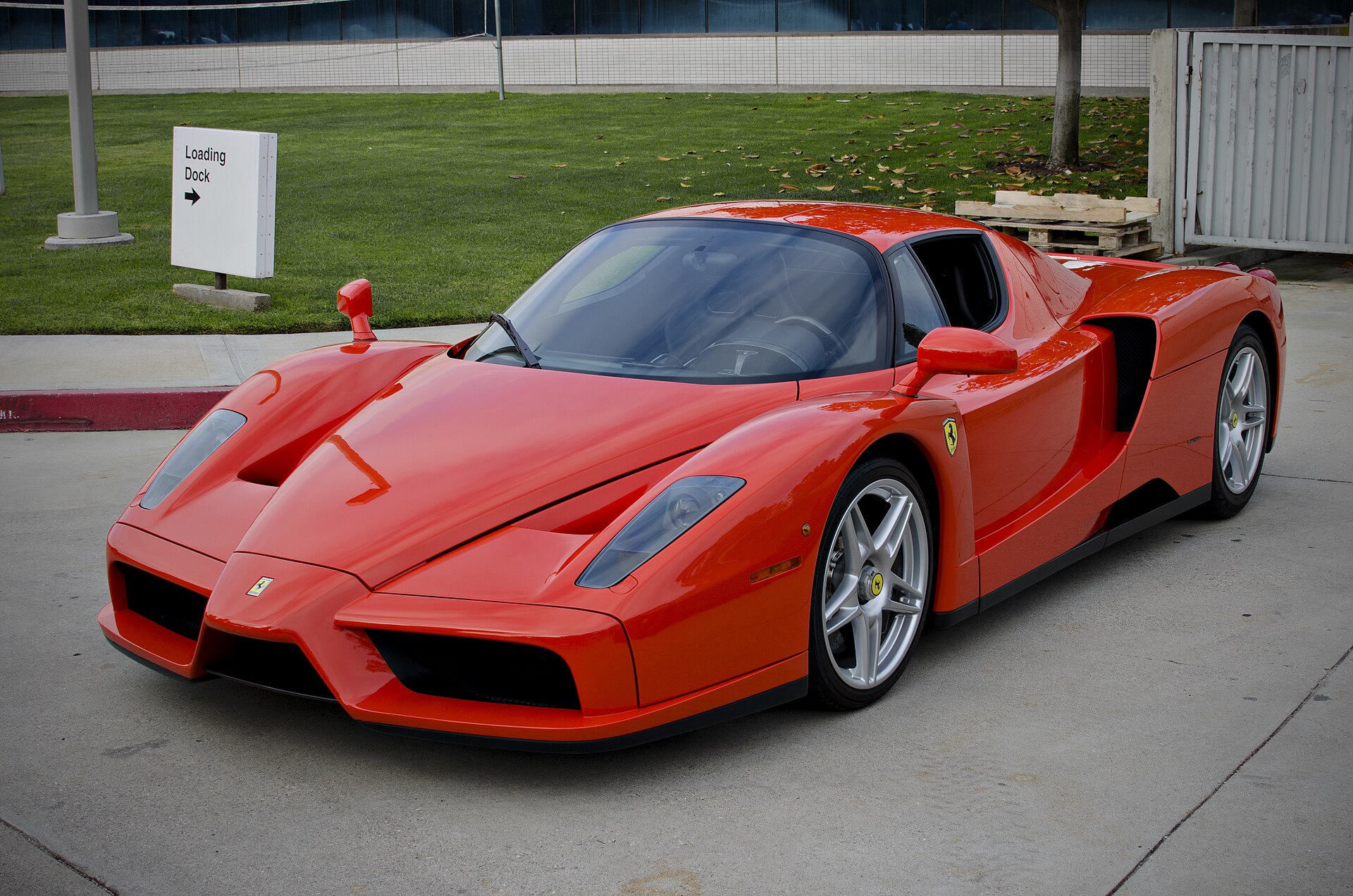 Orange Ferrari Enzo, a rare supercar from the early 2000s.