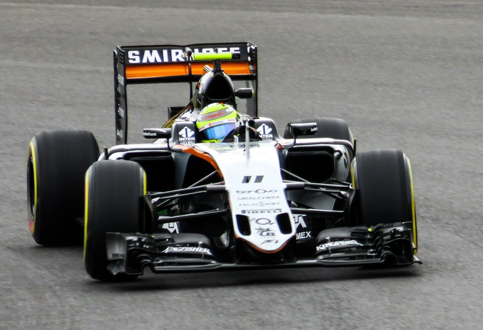 Sergio Perez driving a Force India Formula One car.
