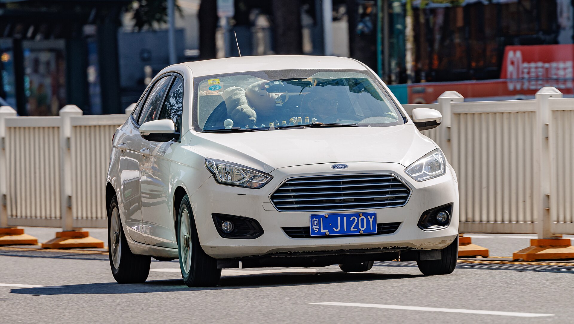 Ford Escort (China) at an auto show, front three-quarter view.