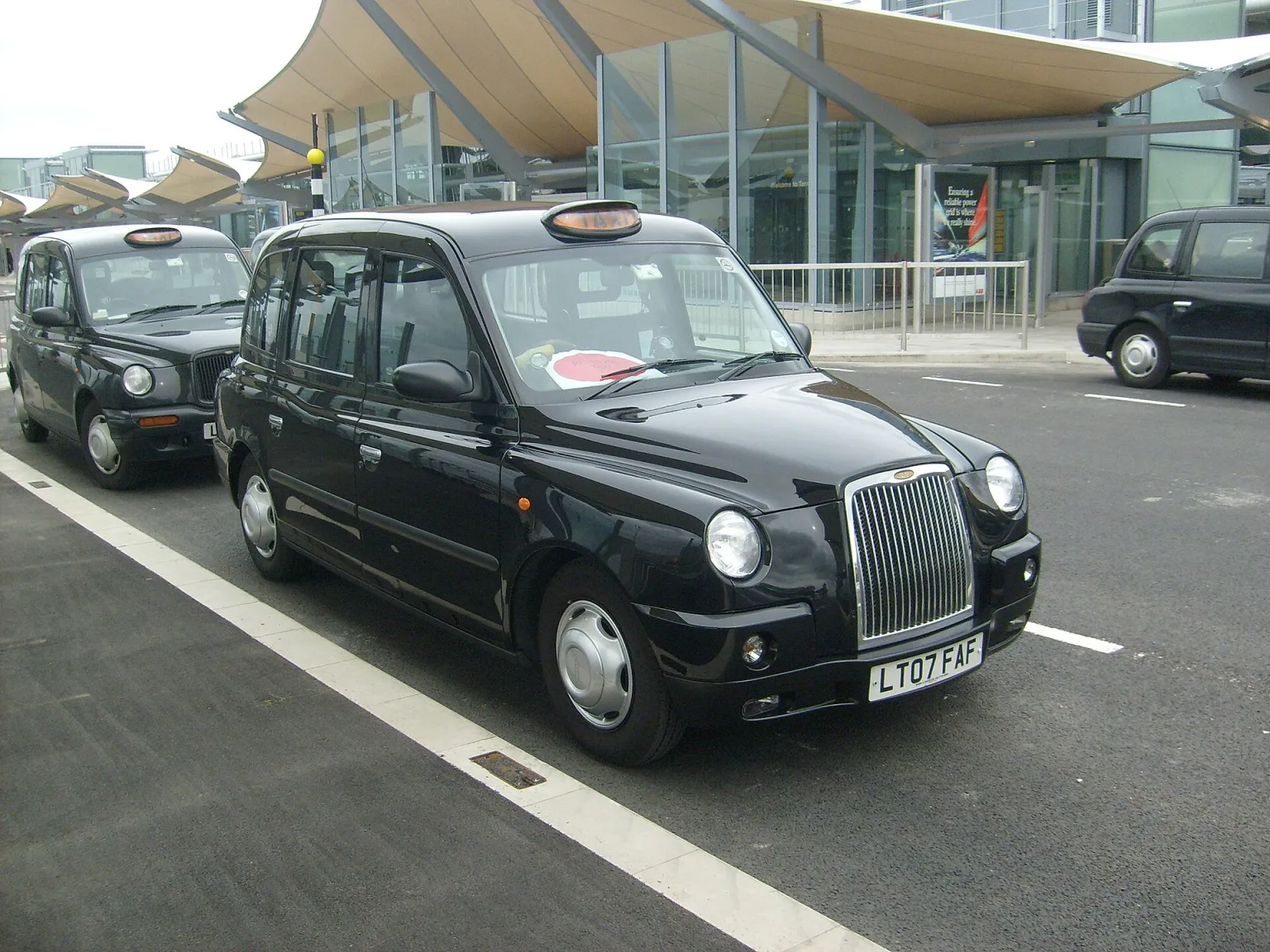 A TX4 taxi at Heathrow Airport Terminal 5.