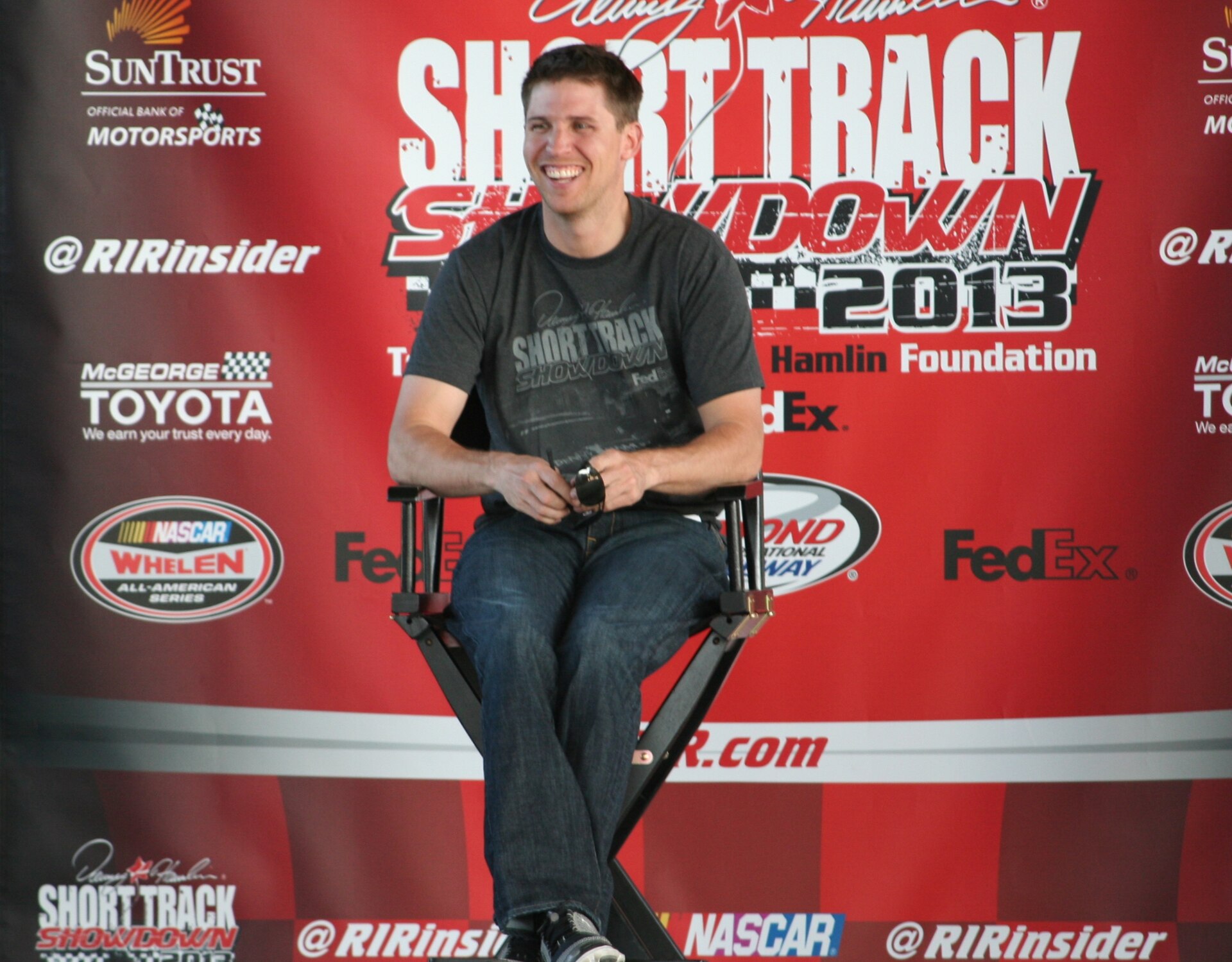 Denny Hamlin driving a 2013 NASCAR Gen-6 car.