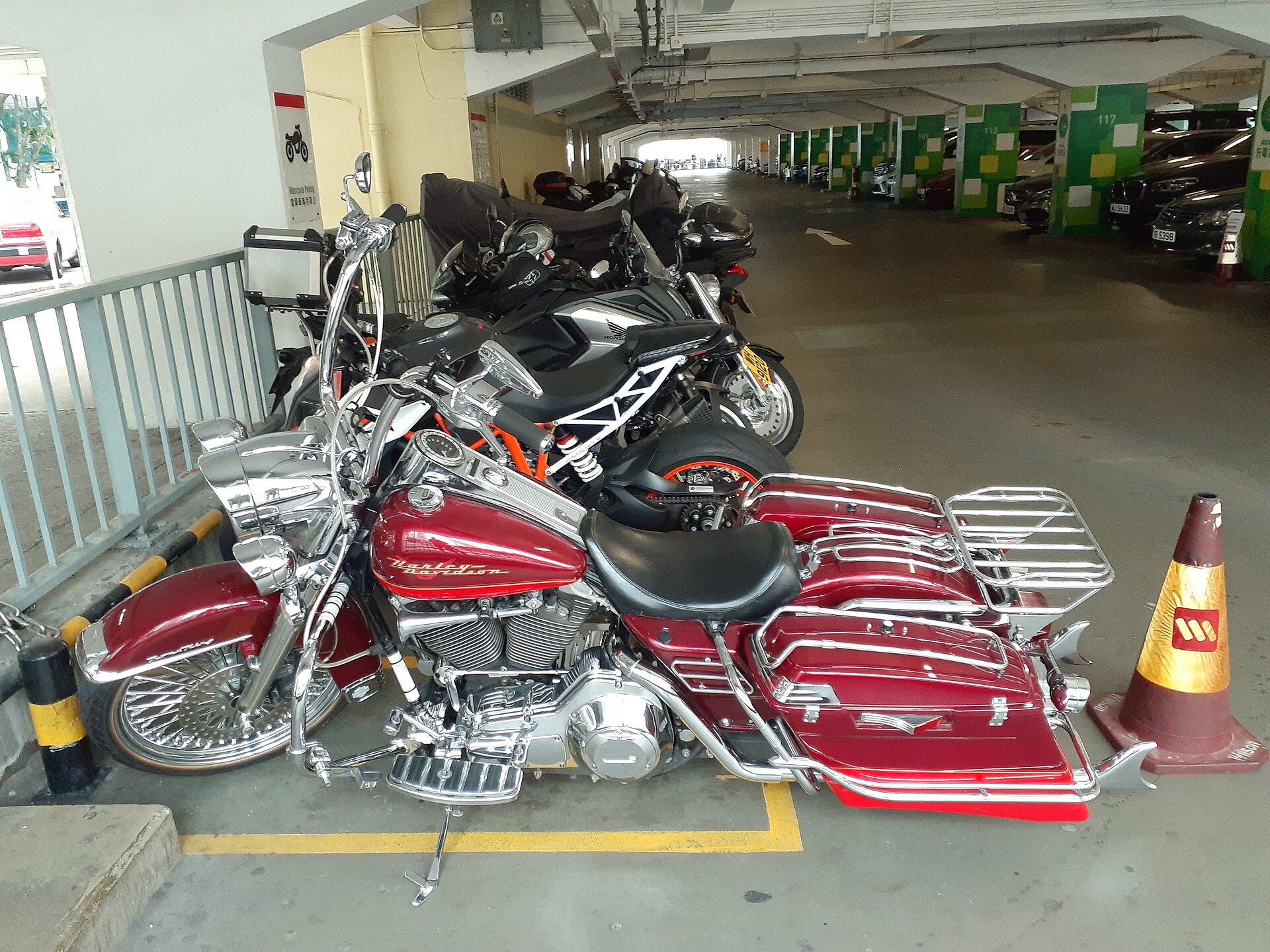 A red Harley-Davidson motorcycle parked in Hong Kong, October 2019.