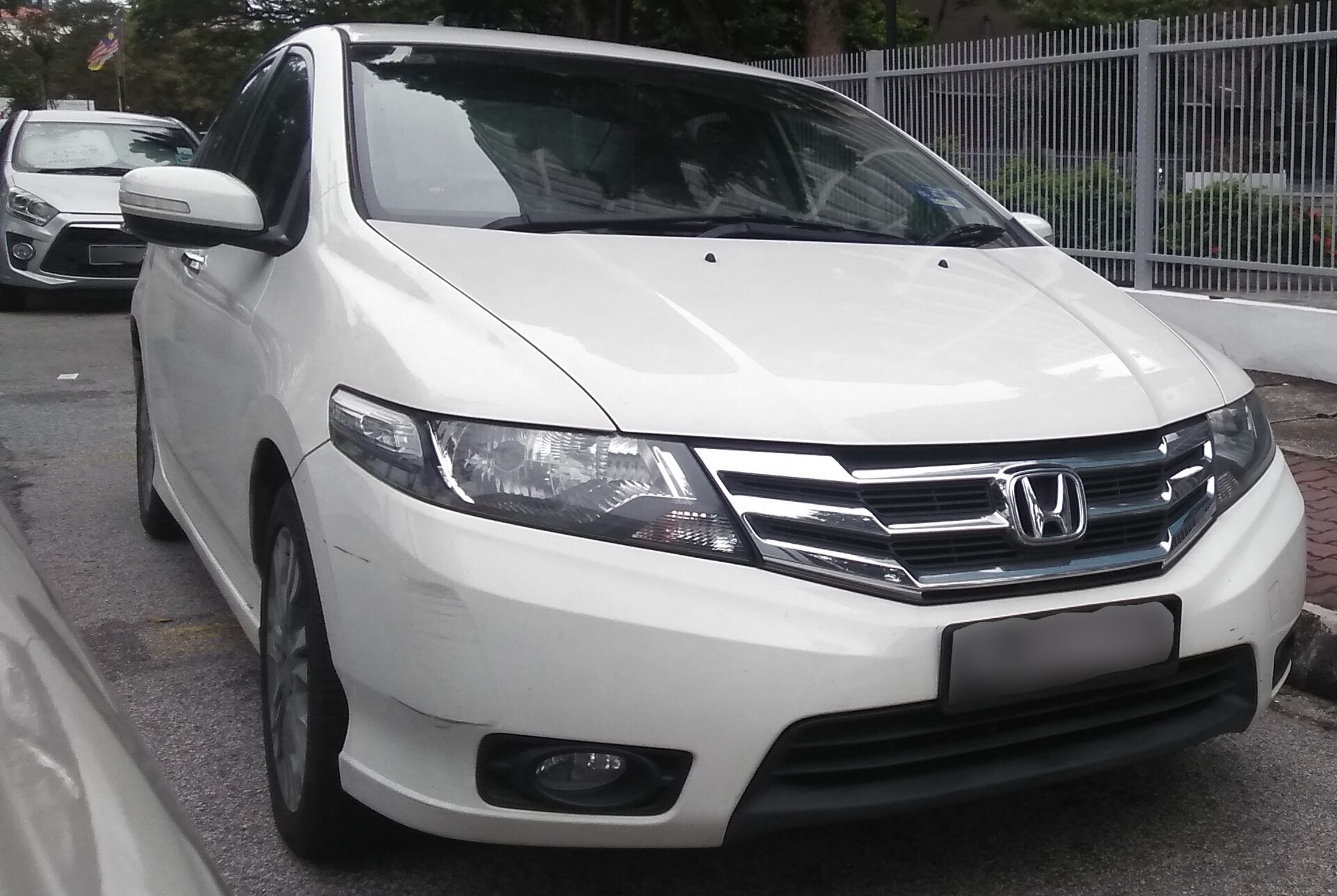 Honda City in Penang, Malaysia, likely the 2012 facelift model.