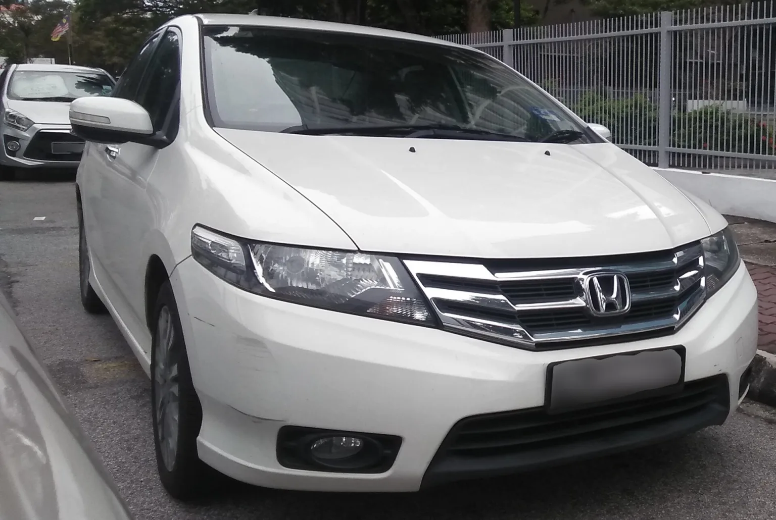 Honda City in Penang, Malaysia, likely the 2012 facelift model.
