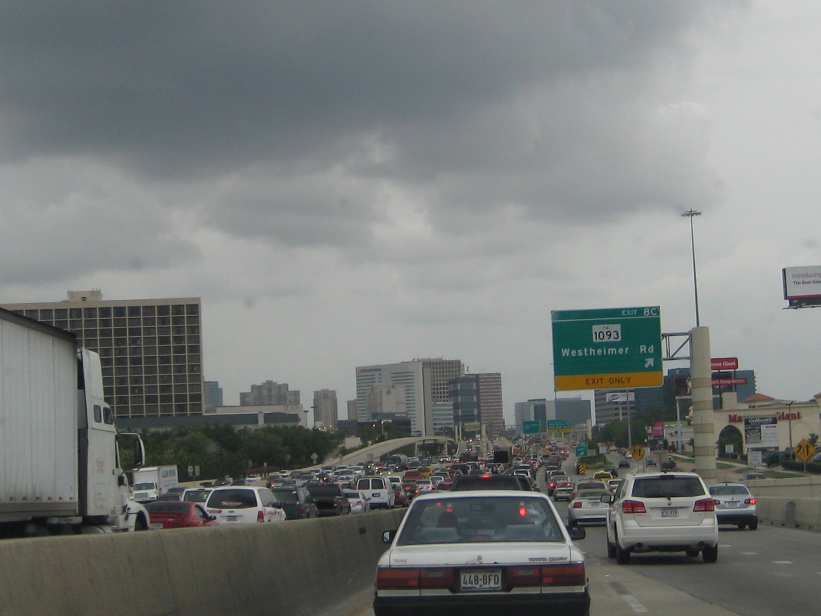 Heavy traffic on a Houston highway, illustrating road congestion.