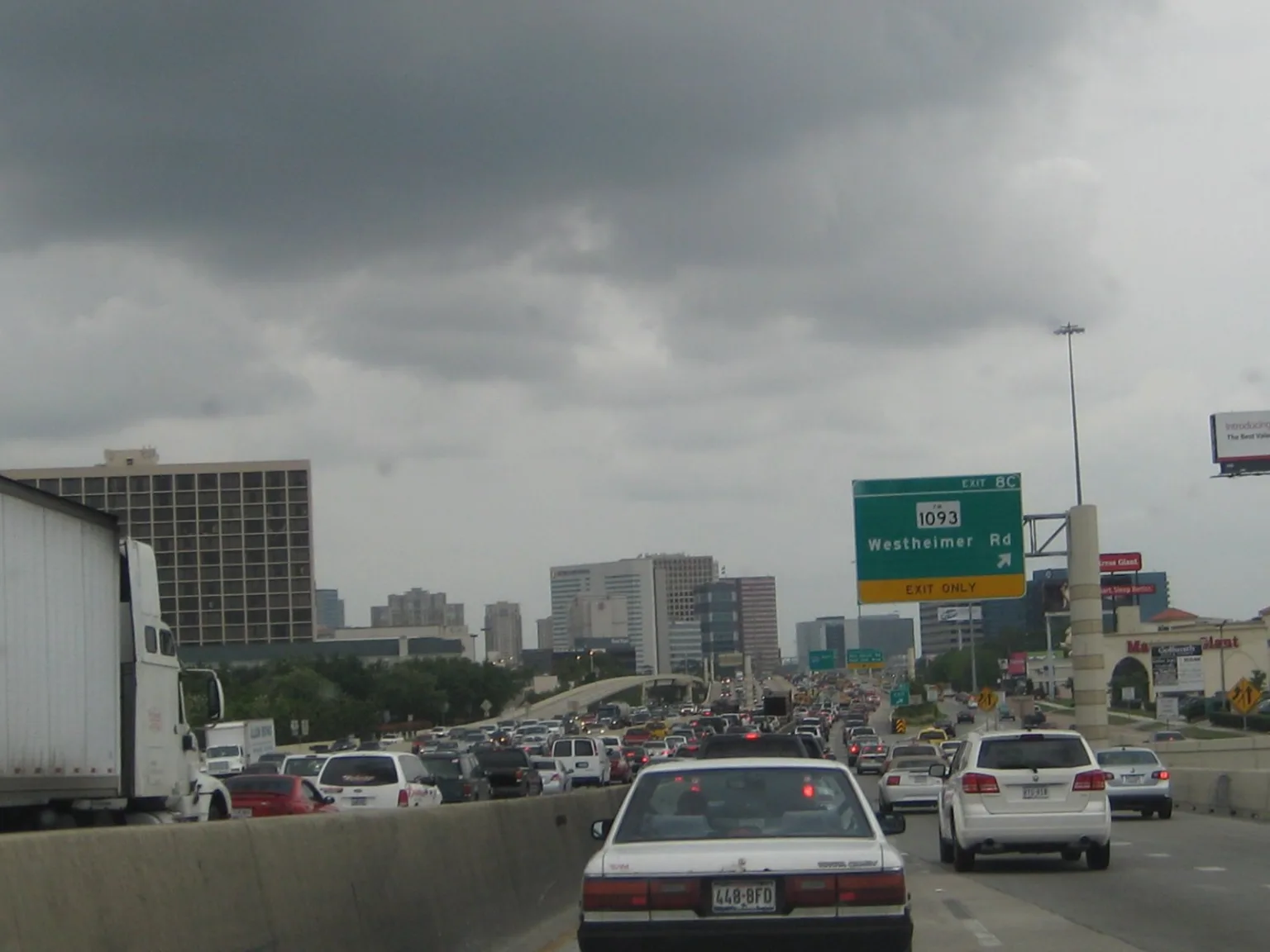 Heavy traffic on a Houston highway, illustrating road congestion.