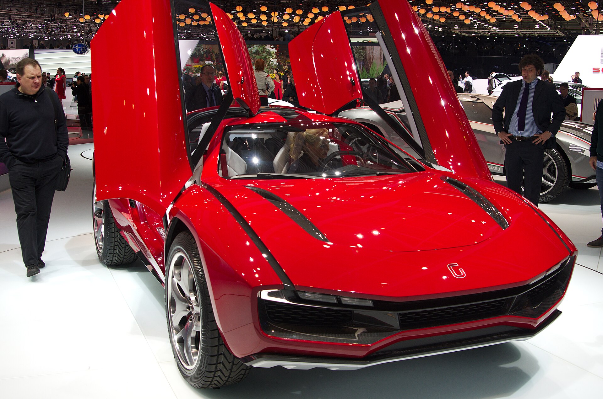 Italdesign Giugiaro Parcour XGT-Coupe, red, front view at Geneva Motor Show 2013.