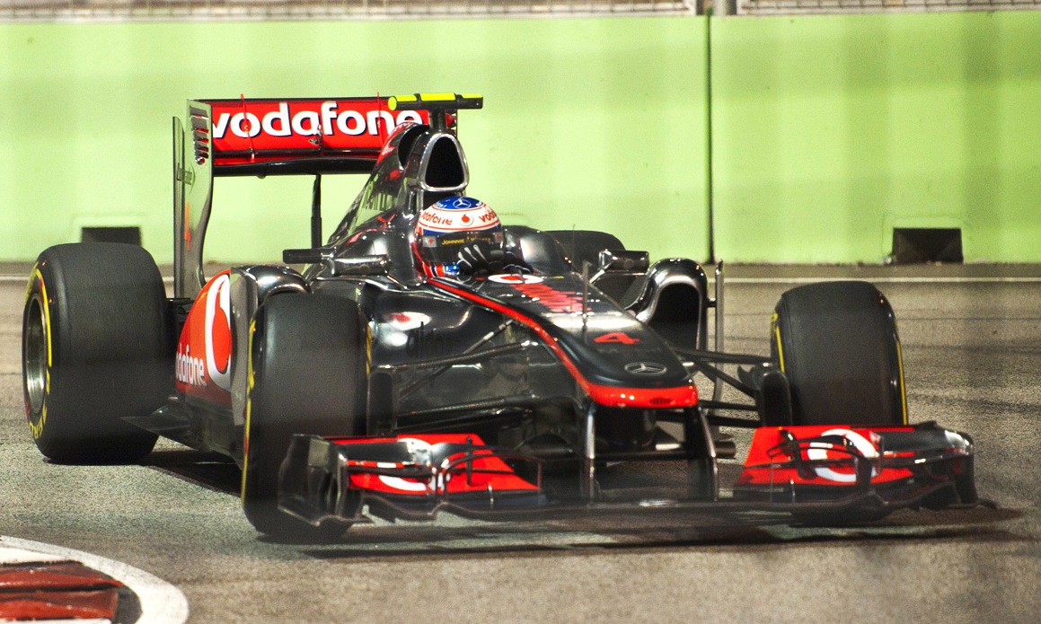 Jenson Button driving the McLaren MP4-26 at the 2011 Singapore Grand Prix.