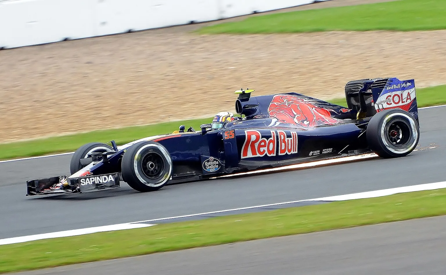 Carlos Sainz Jr. driving the Toro Rosso-Ferrari STR11 at the 2016 British Grand Prix.