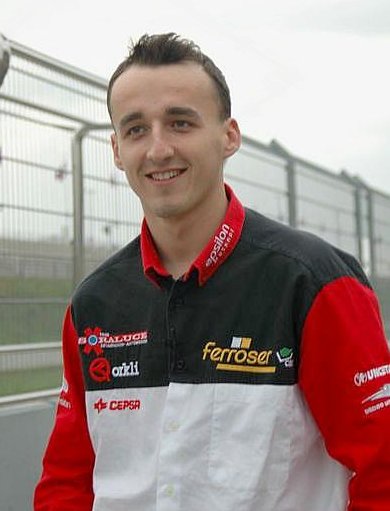 Robert Kubica, Formula 1 driver, pictured in a portrait-style photograph.