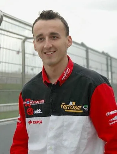 Robert Kubica, Formula 1 driver, pictured in a portrait-style photograph.