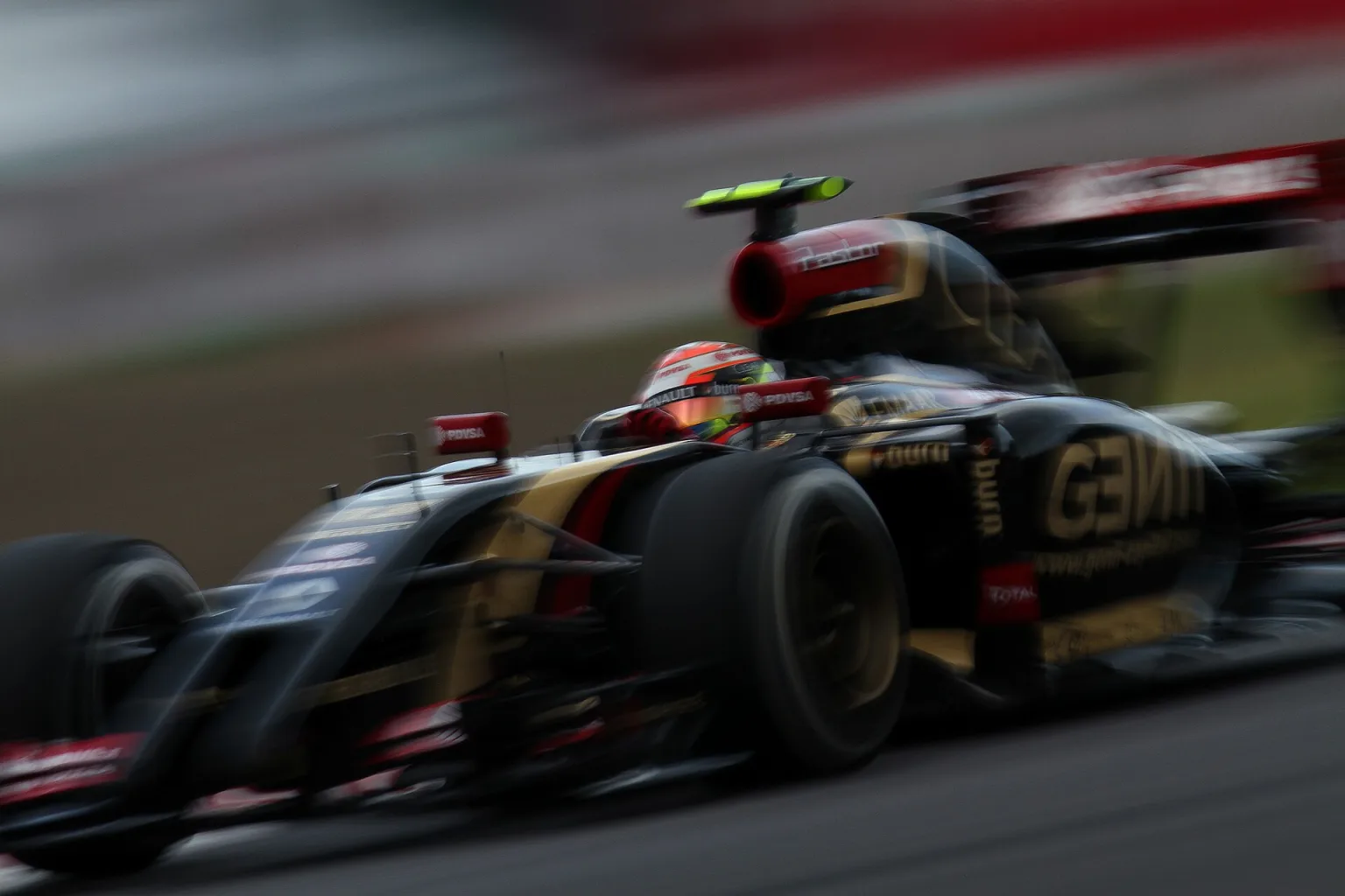 Pastor Maldonado driving the Lotus F1 car, number 13.