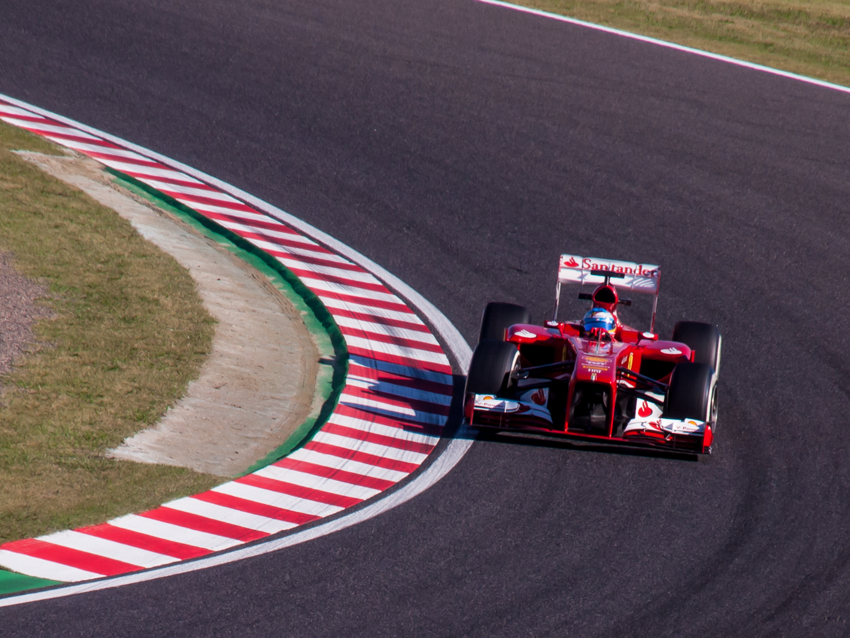 Fernando Alonso driving the Ferrari F138 in 2013.