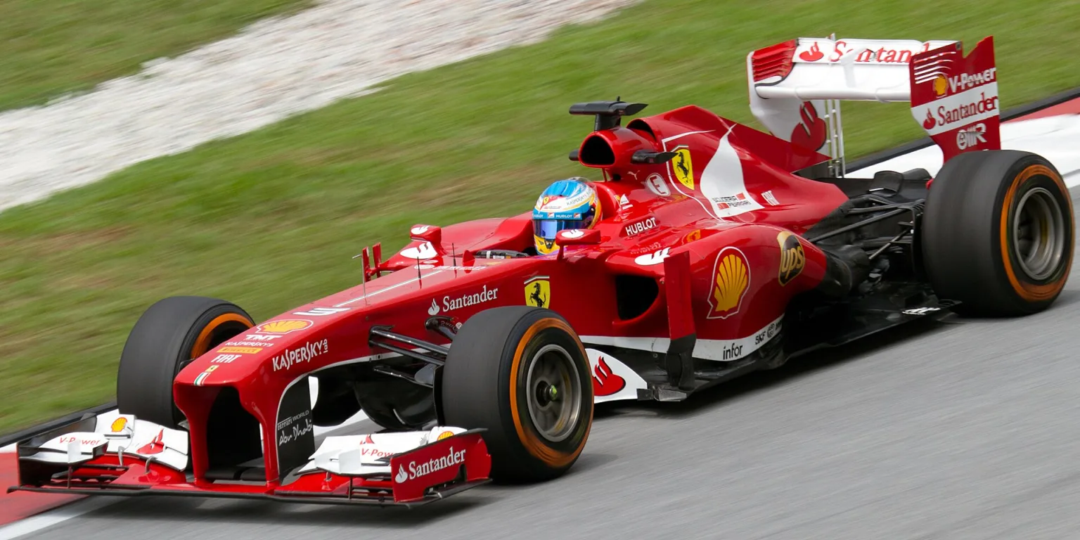 Fernando Alonso driving the Ferrari F138 in 2013 Malaysia FP2.