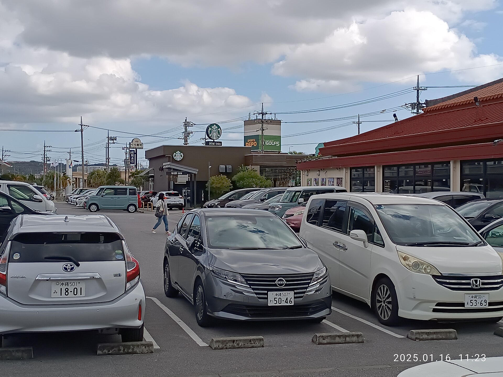 Honda, Toyota, and Nissan cars in Okinawa, Japan, January 2025