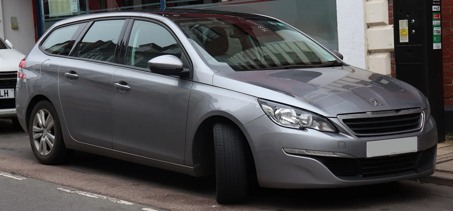 2014 Peugeot 308 SW Active HDi 1.6 front view