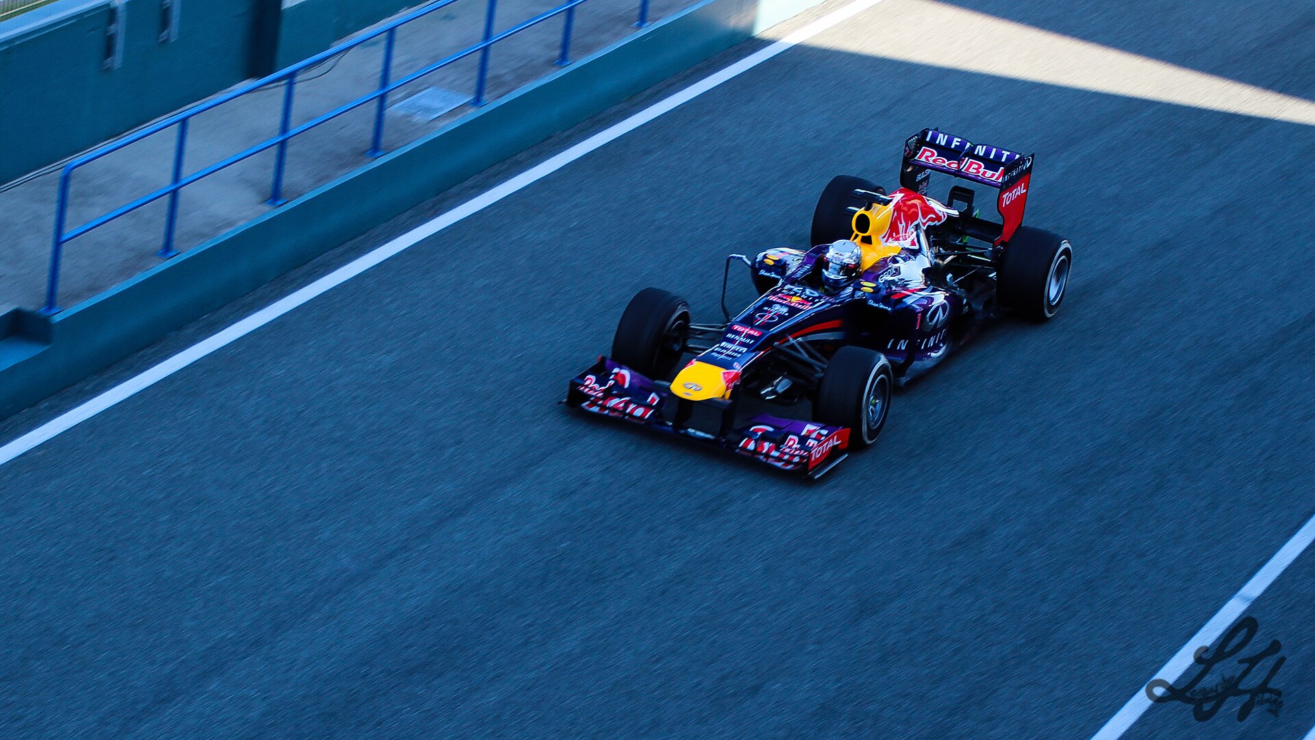 Sebastian Vettel driving the Red Bull RB9 at Jerez in 2013.