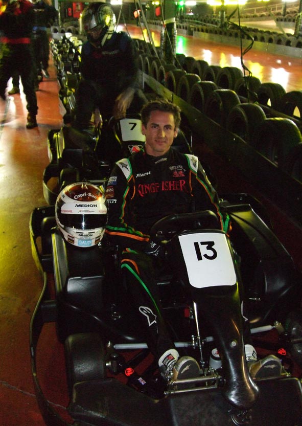 Adrian Sutil with a Force India Formula 1 car at Tower Bridge